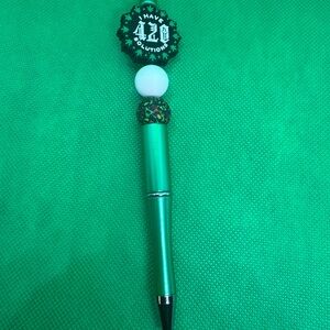 Green Novelty Pen with Decorative Top